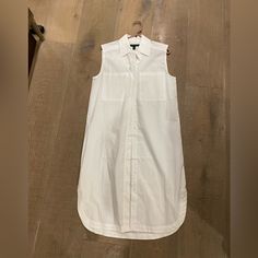 New With Tags White Button Down Dress Sleeveless Banana Republic White Sleeveless Casual Dress With Button Closure, Fitted Sleeveless Shirt Dress With Buttons, Fitted Sleeveless Button Shirt Dress, Sleeveless Midi Dress With Button Closure For Day Out, Sleeveless Dresses With Button Closure For Daywear, Sleeveless Cotton Midi Dress With Buttons, Sleeveless Buttoned Shirt Dress, Button-up Sleeveless Dress For Daywear, Sleeveless Button-up Dress For Daywear