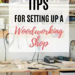 a desk with a sign that says tips for setting up a woodworking shop