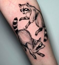 a raccoon tattoo on the right arm and leg, with other raccoons