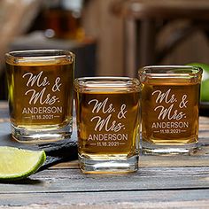 three shot glasses with the names mr and mrs on them next to a lime slice