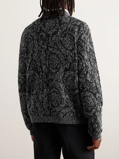 The ornate lines of Versace's sweater are inspired by Baroque art and acanthus, a hero motif for the Italian label. It's knitted from cotton-blend that feels densely structured rather than slouchy. Versace Sweater, Baroque Art, Vintage Pullovers, Versace Collection, Jacquard Sweater, Sweater For Men, Versace Outfit, Wardrobe Edit, Grey Knit Sweater