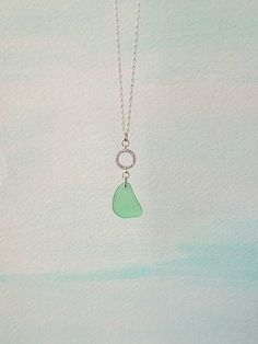 "Hailing from a mind-spinning variety of original sources, authentic sea glass comes in every color of the rainbow and each shade in between, manifesting in an astonishing array of configurations and forms; so naturally, certain pieces are less common than others. Indeed, while most genuine green sea glass is ordinarily relatively commonplace, surf-tumbled specimens representing the blue-kissed, sea-toned or teal side of the gorgeous green spectrum -- as beautifully illustrated by the stunning s Green Recycled Glass Necklaces For Jewelry Making, Green Sea Glass Necklace For Jewelry Making, Green Sea Glass Necklaces For Jewelry Making, Handmade Green Sea Glass Necklace, Purple Choker, Seaglass Necklace, Seaglass Jewelry, Unique Pendant Necklace, Sea Glass Necklace