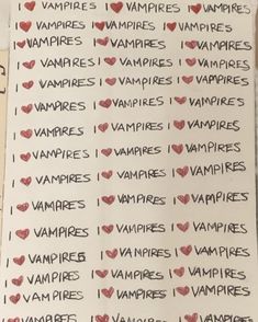 i love vampire stickers are on the wall in front of a sign that says,