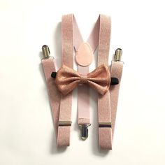 Rose gold wedding, rose gold suspenders, rose gold bowtie, rose gold bowtie, rose gold suspenders, rose gold bridal party, rose gold party by crystalAmour on Etsy https://www.etsy.com/listing/686142789/rose-gold-wedding-rose-gold-suspenders Elegant Party Belt With Bow, Fitted Belts And Suspenders With Bow For Party, Adjustable Gold Bow Tie For Party, Elegant Adjustable Gold Belts And Suspenders, Rose Gold Bridal Party, Gold Suspenders, Gold Bowtie, Rose Gold Tie, Peach Bow Tie