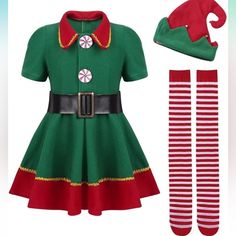 a green dress with red and white striped leggings and a matching hat for christmas