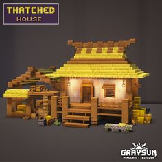 an image of a house made out of legos and wood blocks with the text thatched house above it