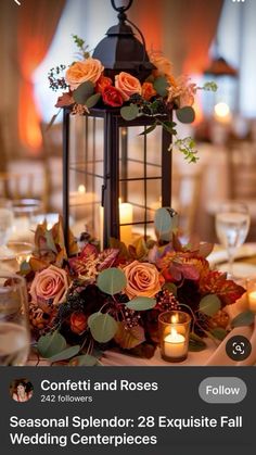 an image of a table setting with candles and flowers on it for a wedding reception