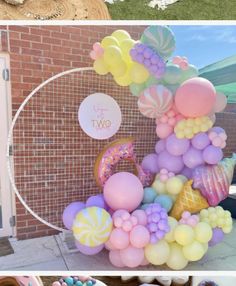 a bunch of balloons that are in front of a brick wall with the words congratulations on it