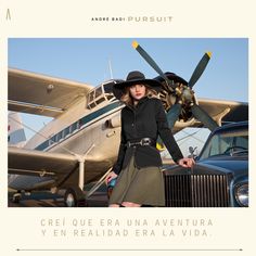 a woman standing in front of an airplane