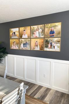 a dining room with pictures on the wall