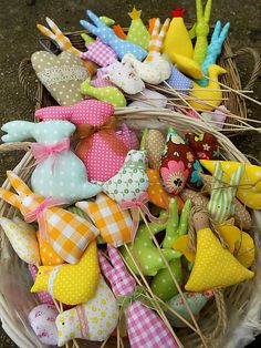 a basket filled with lots of colorfully decorated items