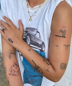 a person with tattoos on their arms