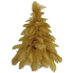 a tall yellow feather tree on a white background