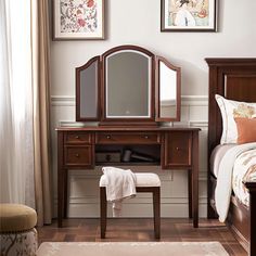 a bedroom scene with focus on the dressing table