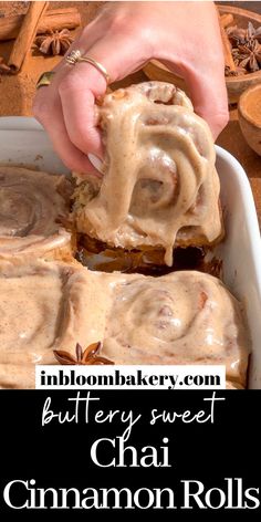 cinnamon rolls with buttery sweet - chai glaze in a white baking dish