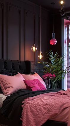 a bed with pink and black sheets in a bedroom next to a window, potted plant