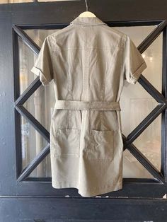 Christina military style dress with short sleeves and button front.    97% cotton/3% elastine    made in the usa Military Style Dress, Ribbed Skirt, Perfect White Tee, Sweater Jumpsuit, Denim Outerwear, Button Up Dress, Short Sleeve Button Up, Summer Accessories, Military Fashion