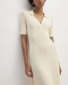 Meet the Viscose Knit Polo Midi Dress. This piece features a fitted silhouette, midi-length with an open polo neck, and short sleeves in 65% viscose and 35% recycled nylon. Dress Beige, Knit Polo, Polo Neck, Fitted Silhouette, Midi Length, Midi Dress, Short Sleeves, Knitting, Dresses