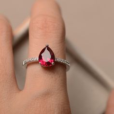 Lab ruby ring pear cut red gemstone ring sterling silver | Etsy Formal Pear-shaped Ruby Ring, Formal Red Pear-shaped Ruby Ring, Classic Ruby Ring With Pear-shaped Stone, Pear-shaped Birthstone Promise Ring, Classic Pear-shaped Ruby Ring, Classic Pear-shaped Red Rings, Classic Red Pear-shaped Rings, Formal Teardrop Ruby Ring In Fine Jewelry Style, Fine Jewelry Red Teardrop Ruby Ring