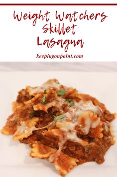 a white plate topped with lasagna covered in meat and cheese, text reads weight watchers skillet lasagna