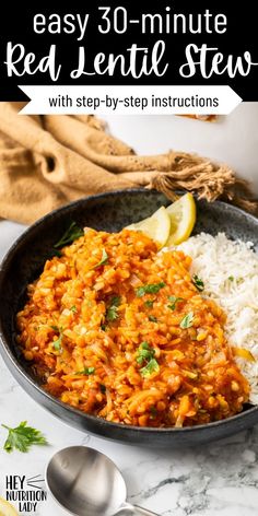 red lentil stew in a skillet with rice and lemon wedges on the side