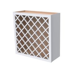 a white cabinet with lattice design on the front and side panels, made out of wood