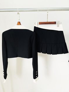 Experience the ultimate in style with this women's crop jacket and mini skirt set. The single button closure, trendy notched collar, and charming pleated mini skirt create a fashion-forward ensemble. Crafted from high-quality polyester, it guarantees both comfort and a chic look, making it perfect for the summer season. Stay effortlessly on-trend with this must-have two-piece set.Specifications Style: High Street Sleeve Style: Regular Sleeve Length(cm): Full Silhouette: Pleated Season: Summer Place Of Origin: China (Mainland) Pattern Type: Solid Pant Closure Type: Zipper Fly Origin: Mainland China Model Number: TS161 Material Composition: Natural fiber Material: Polyester Gender: WOMEN Fabric content: 81% (inclusive) - 90% (inclusive) Fabric Type: Polyester Cotton Dresses Length: Above Kne Fitted Two-piece Long Sleeve Blazer, Fall Fitted Mini Length Skirt Suit, Fall Fitted Mini Skirt Suit, Fall Mini Length Fitted Skirt Suit, Chic Mini Length Fall Sets, Chic Fall Mini Length Sets, Chic Fall Mini Sets, Fitted Mini Skirt Suit For Fall, Chic Mini Skirt Sets For Fall