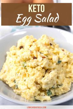 an egg salad in a white bowl with the words keto egg salad