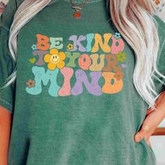 "Comfort Colors® Be Kind To Your Mind Shirt, Be Kind Mental Wellness Shirt Women, Be Kind Anxiety Shirt, Positive Vibes Shirt 🌟🛍️ Welcome to the enchanting realm of FB Apparel Co, where your shopping dreams become a magical reality! Prepare to be dazzled by our meticulously curated selection, crafted with love and care to provide you with an extraordinary shopping experience that will leave you radiating with joy! 😄✨ 👕 Behold the wonders of the Comfort Colors Tee, a true masterpiece of unise Be Kind To Your Mind, Soothing Bath, Western Graphic Tees, Nicu Nurse, Kindness Shirts, Comfort Colors Tee, Match Making, Be Kind To Yourself, Mental Wellness