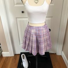 Forever 21 Nwt Light Purple Pleated Mini Skirt. White Crop T Top. White Canvas Tennis Shoes. Pull The Look Together With All Three For A Discounted Price Or Each Item Sold Separately. Skirts: 1 Small And 1 Medium Top: White - 1 Small And 1 Medium Taupe - 1 Small Tennis Shoes - 1 6m, 1 M7, 1 8m, 2 - 9m, 1 10m All Forever 21 And Nwt Super Cute Look. Fresh For Upcoming Summer Fun. This Price Includes The Full Look. Items Sold Separately In My Closet. Casual Purple Mini Pleated Skirt, Purple Casual Pleated Skirt For Summer, Purple Summer Skirt For School, Casual Purple Pleated Lined Skirt, Purple Summer School Skirt, Summer School Purple Skirt, Casual Purple Mini Tennis Skirt, Casual Purple Pleated Tennis Skirt, Purple Mini Skirt For School In Summer