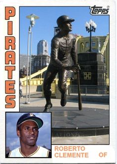 a baseball card with a statue of a man holding a bat and wearing a hat