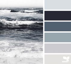 the color scheme is blue and gray, with waves crashing in to the shore below