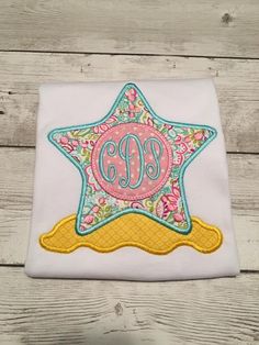 Star fish monogram shirt is perfect for summertime. Great for trips to the beach or just to wear during the summer months. In the note to seller's box please be sure to leave child's monogram. Monogram format is first name initial, last name initial, and middle name initial. If only initial's are left I will assume they are in correct format. If unsure just leave child's name and I will place into correct format. Want to change colors? No problem we can customize this just for you. I can change Monogram Applique, Monogram Shirt, Fish Shirt, Applique Monogram, Boutique Style Outfits, Girl Beach, Monogram Shirts, Star Fish, Applique Shirts