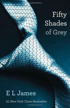 a close up of a tie with the words fifty shades of grey