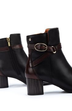 A slender buckle strap wraps around the shaft of a leather bootie balanced upon a study block heel. 2" heel 6" shaft Cushioned insole Leather upper/leather and textile lining/synthetic sole Imported Fuzzy Heels, Women's Leather Shoes, Womens Casual Boots, Over The Calf Socks, Mens Boots Casual, Waterproof Winter Boots, Pull On Boots, Leather Shoes Woman, Womens Clogs