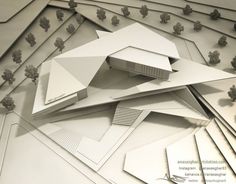 an architectural model of a building surrounded by trees