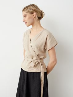 This is a ready-to-ship item. All sizes and full color swatch available in regular selection.  This elegant V-neck linen blouse with short sleeves is easily adapted to the body thanks to the wrap design and laces. Laces can be tied in the back or in the front. This linen wrap top is a perfect pair with wide-leg trousers and flared or ruffled skirts. STYLE DETAILS * Adjustable fit  * V-neckline * Wraparound ties * Short sleeves * French seams inside * Made from medium linen SIZES & COLORS IN PICT Linen Uniform, Sewing Linen, Infinity Top, Kimono Wrap Top, Linen Wrap Top, Moda Kimono, Kimono Sleeve Top, Plus Size Linen, Linen Kimono