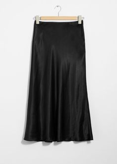 High-waist midi skirt with a glossy satin finish. Secured with a zipper at the side.Length of skirt:82.5cm / 32.5" (EU 36 / UK 8 / US 4) Black Satin Skirt, Summer Style Guide, Waistcoat Dress, Skirts Midi High Waisted, Satin Midi Skirt, Black Midi Skirt, Blazer And Shorts, Tshirt Skirt, Midi Skirts