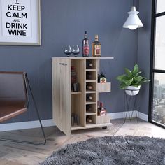 a room with a chair, table and wine rack