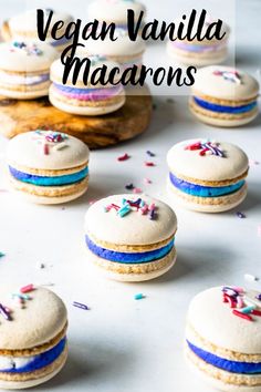 vegan vanilla macarons with white frosting and sprinkles on top