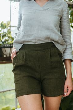 "DETAILS: - 100% linen shorts - pockets - pleats in front - flat front waist - elastic in back waist - mid-rise - waist comes to belly button LENGTH inseam is 4\" / 10cm from crotch point -  MODEL is pictured above in Heavy-weight Moss  FABRIC: - The mid weight linen is 5.3oz / 150g. It is very soft and has a a nice linen texture with the little imperfections that make linen so lovely.  - The heavy weight linen is 7.1oz / 200g. The surface has a lot of texture from the thicker yarns that give th Moss Fabric, Linen Wrap Top, Boxy Dress, Sleeveless Linen Dress, Linen Tunic Dress, Linen Dress Women, Elastic Waist Dress, Summer Linen Dresses, Linen Shirt Dress