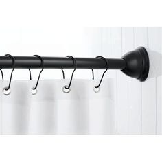 a black curtain rod with hooks attached to it