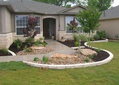 a house with landscaping in front of it