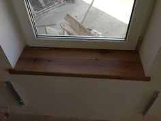 a window sill with some tools on it