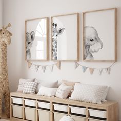 three framed pictures hang on the wall above a wooden bench with storage baskets underneath it