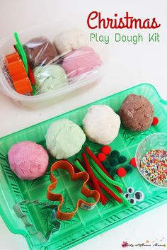 christmas play dough kit with cookie cutters and sprinkles in plastic tray