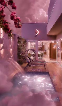 the interior of a modern house with an indoor hot tub in the foreground and pink flowers on the far wall