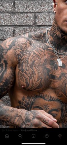 an image of a man with tattoos on his chest and arm, looking at the camera