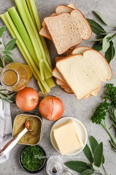 bread, onions, celery, garlic and other ingredients on a counter top