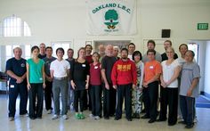 a group of people standing together in a room